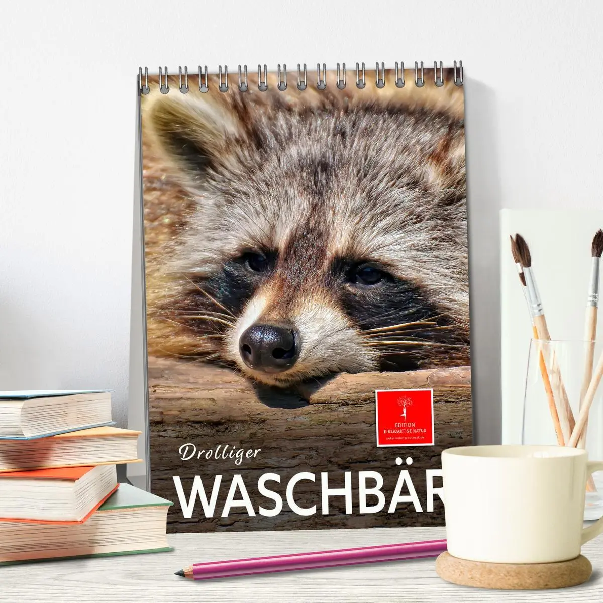 Bild: 9783516347623 | Drolliger Waschbär (Tischkalender 2026 DIN A5 hoch), CALVENDO...