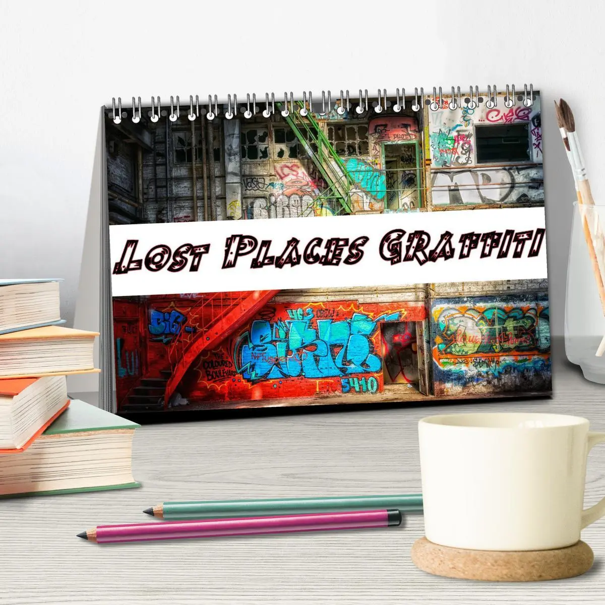 Bild: 9783457720639 | Lost Places Graffiti (Tischkalender 2026 DIN A5 quer), CALVENDO...