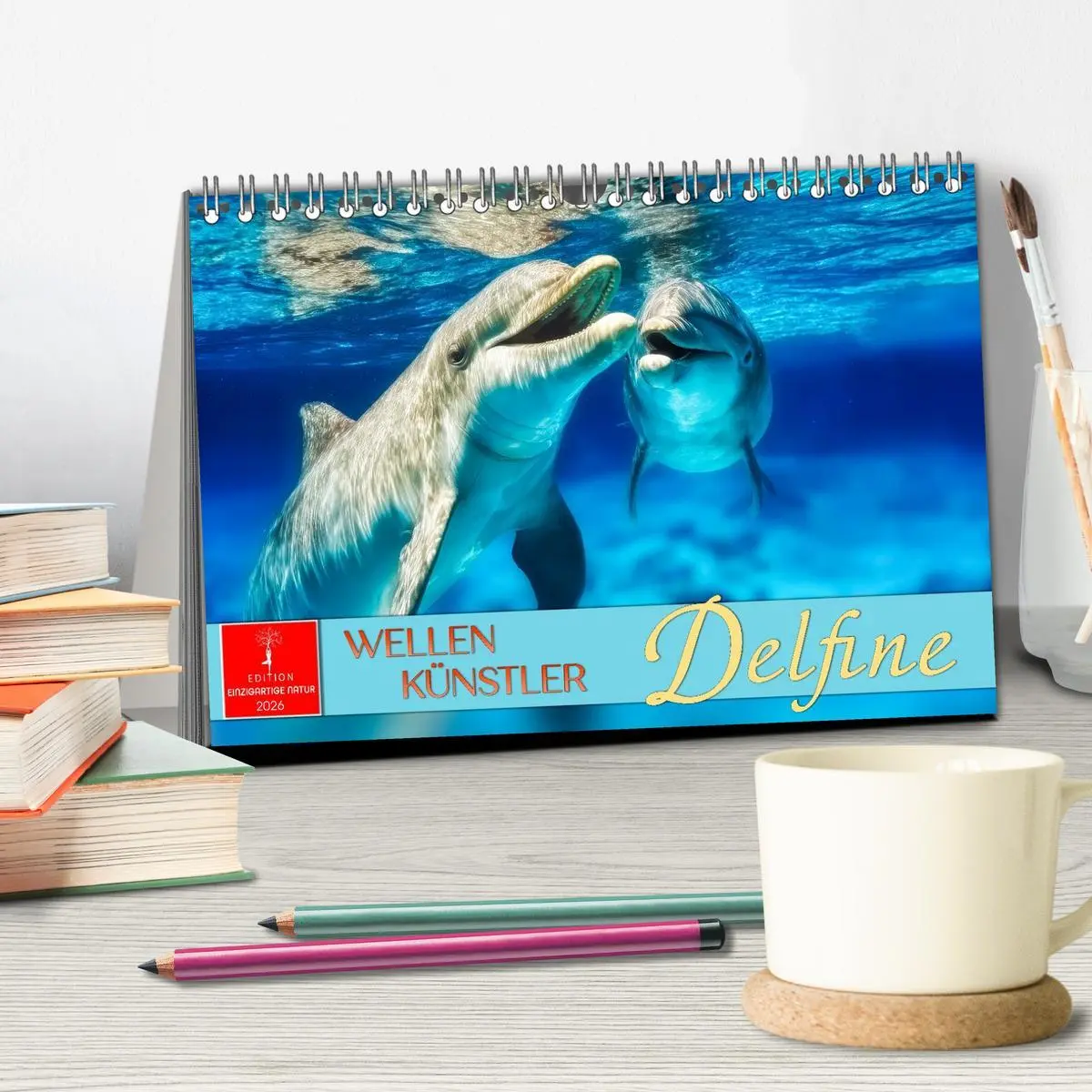 Bild: 9783516215045 | Delfine - Wellen Künstler (Tischkalender 2026 DIN A5 quer),...
