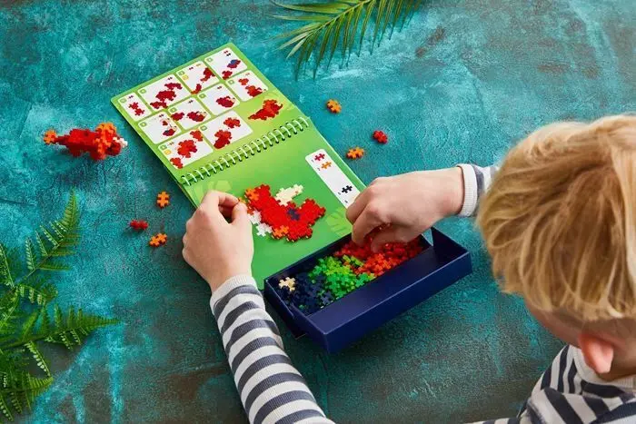 Bild: 5710409111447 | PLUS PLUS - 125 Kreativ Bausteine Puzzle Dinosaurier | In Karton