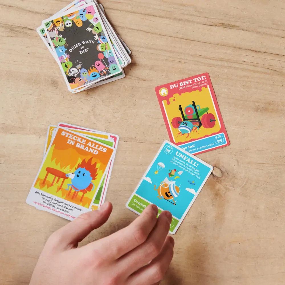 Bild: 681147044258 | BGM Dumb Ways to Die | Spiel | Karton | 44258 | Deutsch | 2025