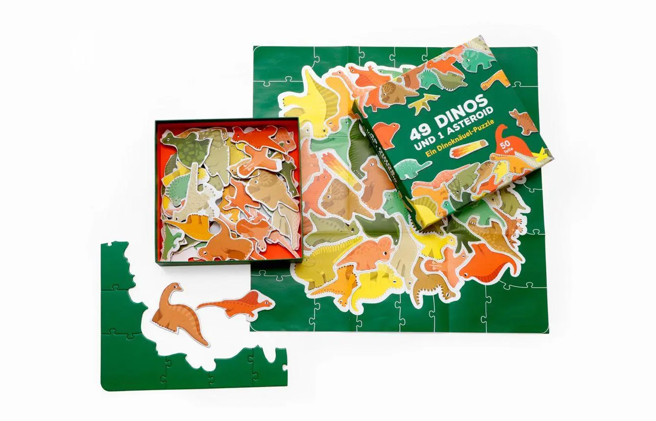 Bild: 9783962442859 | 49 Dinos und 1 Asteroid | Ein Dinoknäuel-Puzzle | Caroline Selmes