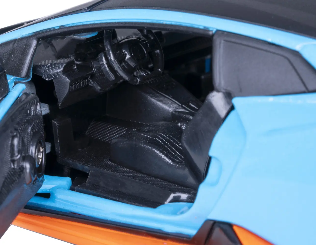 Bild: 4042774475659 | Lamborghini Huracán STO Diecast 1:32 blau inkl. Knopfzellen | 402616