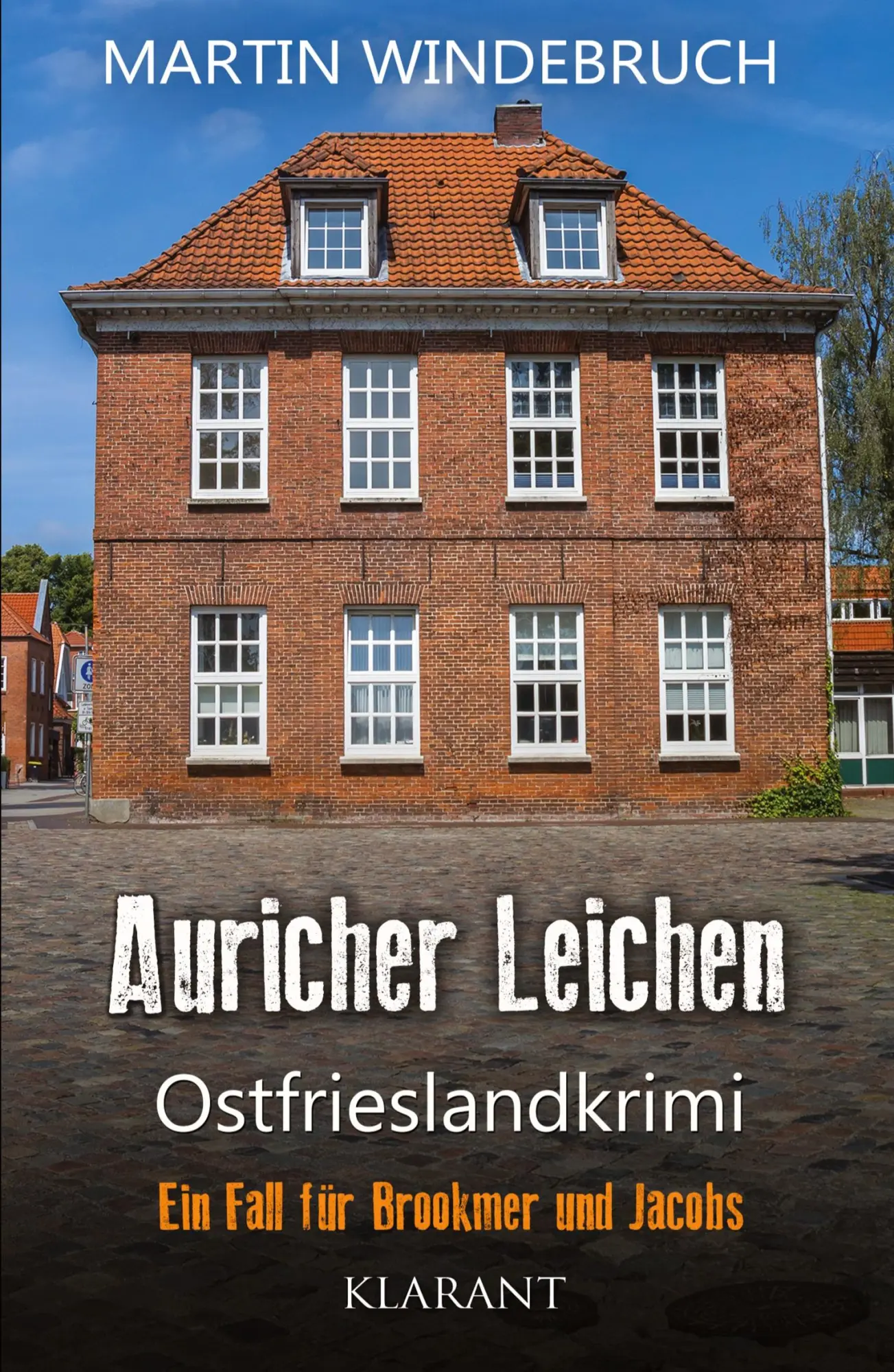 Cover: 9783965864771 | Auricher Leichen. Ostfrieslandkrimi | Martin Windebruch | Taschenbuch