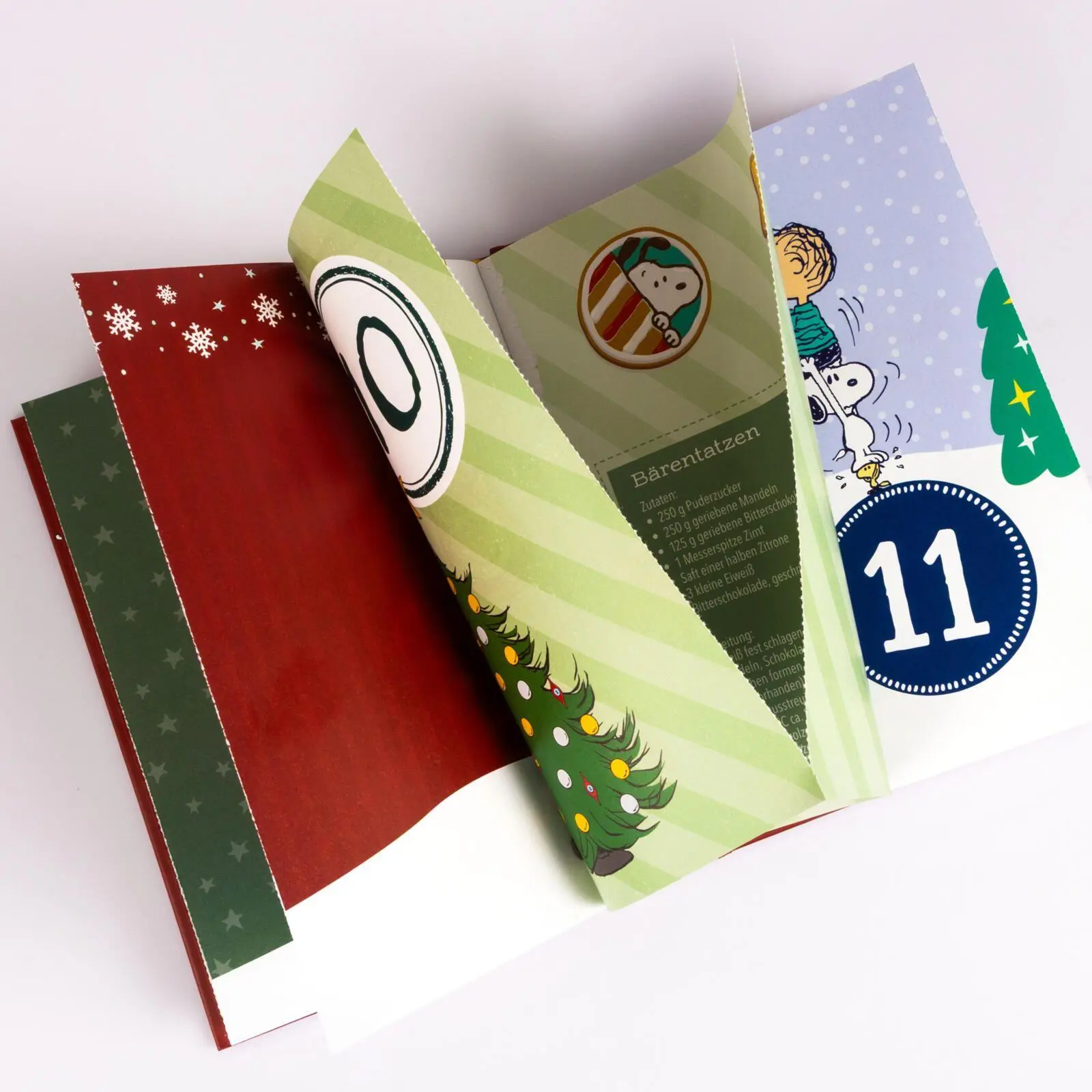 Bild: 9783830322276 | Peanuts Geschenkbuch: Mit Snoopy und den Peanuts durch den Advent