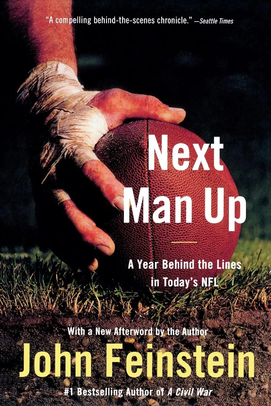 Cover: 9780316013284 | Next Man Up | A Year Behind the Lines in Today's NFL | John Feinstein